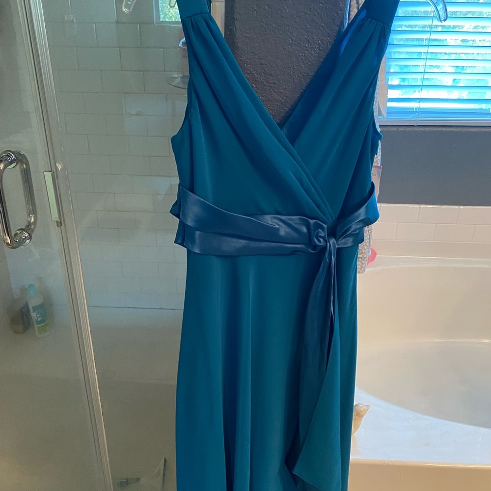 Lovely dress.  Size 10 brand new with tag on